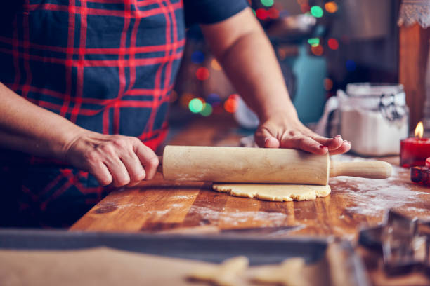 istock Preparing Christmas Cookies in Domestic Kitchen 1175530992