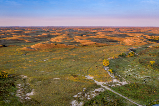 Nebraska Sandhills and a valley of the Middle Loup River in sunrise light - aerial view of late summer or early fall scenery