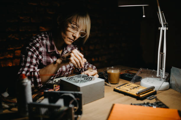 istock Mature female electronics repairing workstation 1175533965