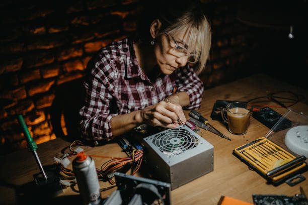 istock Mature female electronics repairing workstation 1175533968