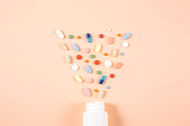 istock Bottle of spilling pills 1175535705