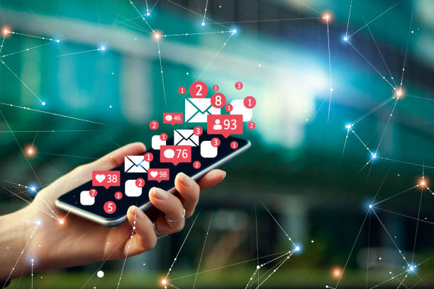 istock Female receives notifications on smart phone 1175535973