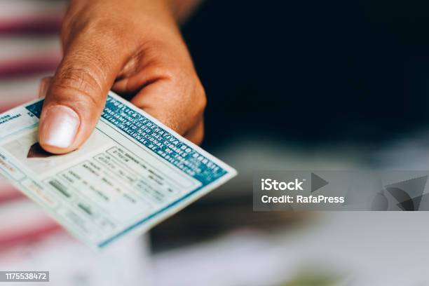 Man Holds National Drivers License Official Document Of Brazil Which Attests The Ability Of A Citizen To Drive Land Vehicles Stock Photo - Download Image Now