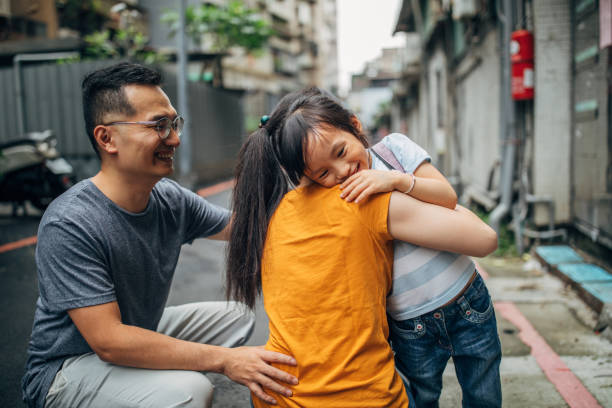 istock Mother and cute daughter hugging 1175538620