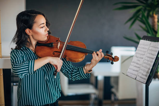 istock Pretty Violinist Woman 1175539074