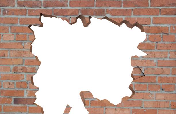 istock Destroyed brick wall. There is an isolated space for your photo or text 1175545082