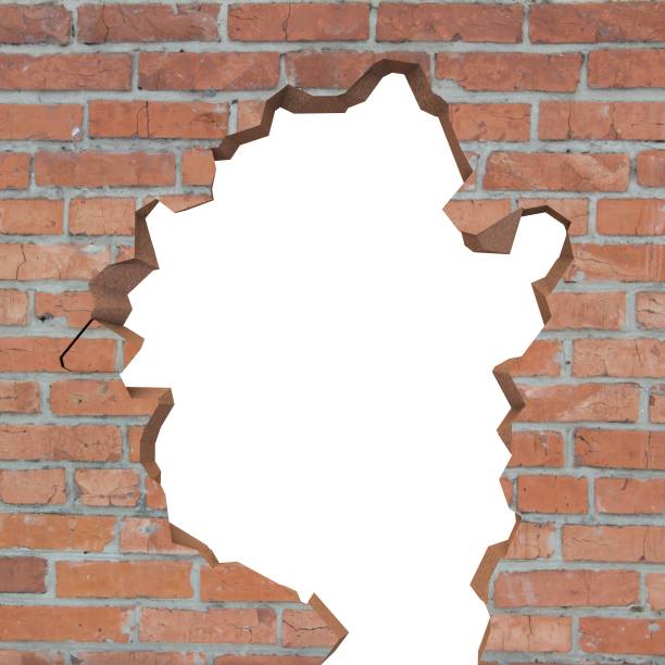istock Destroyed brick wall. There is an isolated space for your photo or text 1175545208