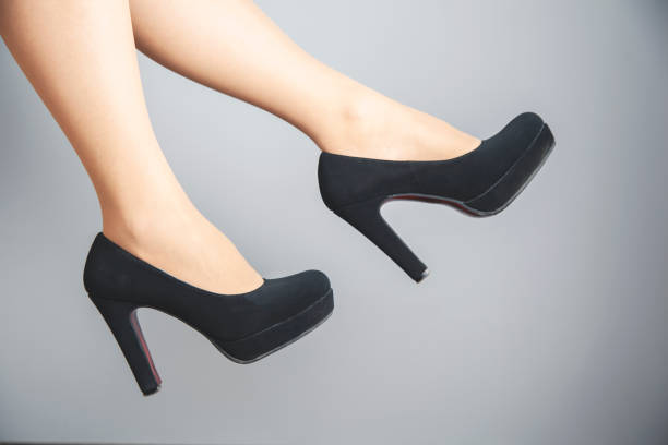 istock woman feet shoes 1175547366