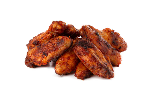 istock Fried wings close-up. Buffalo wings isolated on white. 1175547429