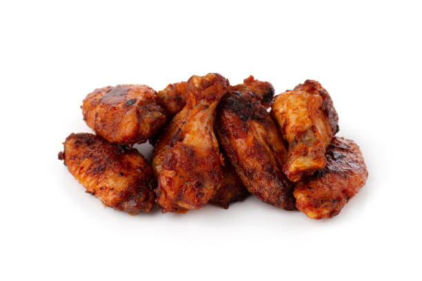 istock Fried wings close-up. Buffalo wings isolated on white. 1175547604