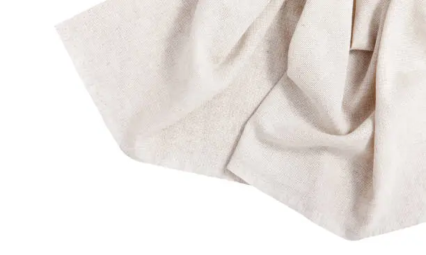 Photo of Napkin isolated on white. Multi-colored linen napkins for restaurant. Mock up for design. Top view.