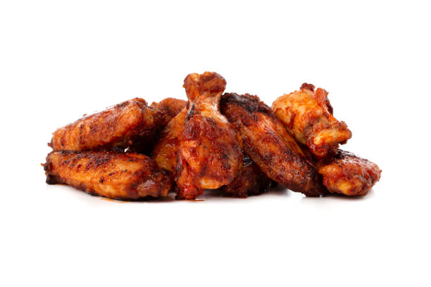 istock Fried wings close-up. Buffalo wings isolated on white. 1175548895