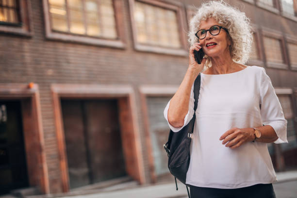 istock Senior woman using phone 1175549231