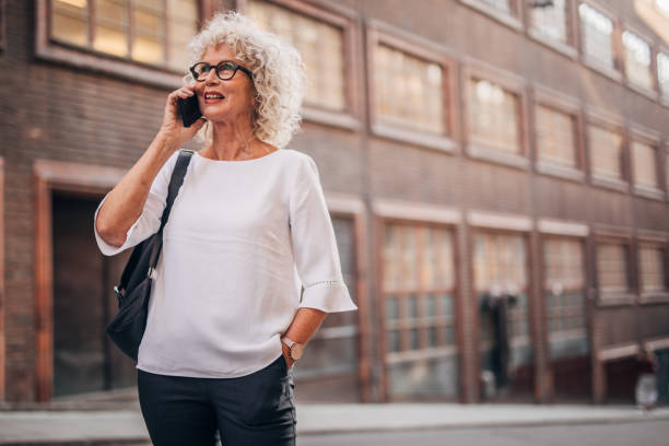 istock Senior woman using phone 1175549278
