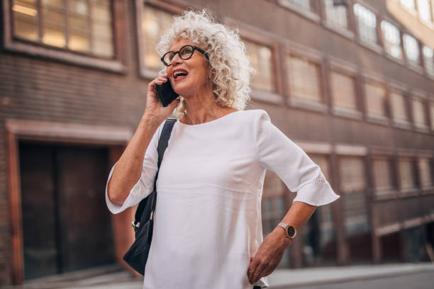 istock Senior woman using phone 1175549363
