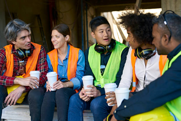istock Multi-ethnic coworkers sitting during coffee break 1175550933