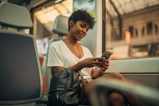 istock Pretty woman in train 1175554050