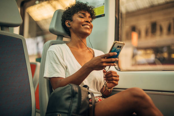 istock Pretty woman in train 1175554102