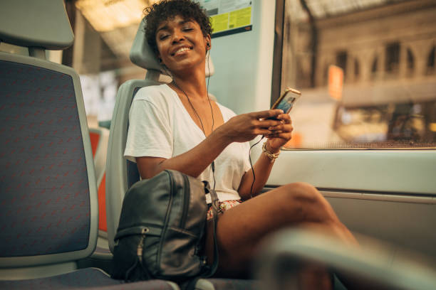 istock Pretty woman in train 1175554129