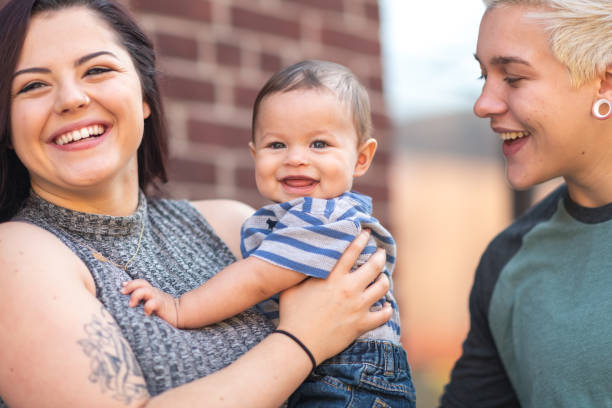 istock LGBT+ family with baby 1175554135