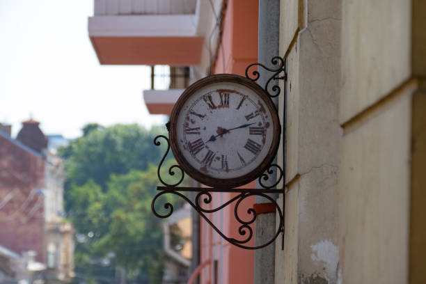 istock Street clock in ornate forging, close up 1175555495
