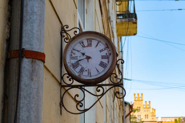 istock Street clock in ornate forging, close up 1175555873