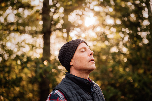 Man walking in autumn in hat and winter clothing
Casual real man portraits outdoors