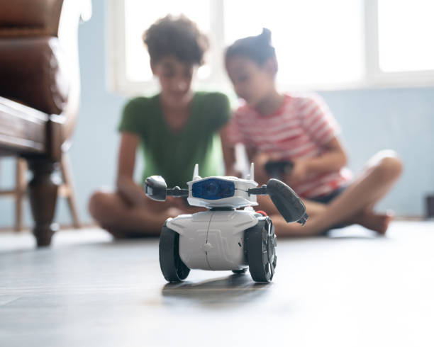istock Brother And Sister Playing With Robotics 1175557778