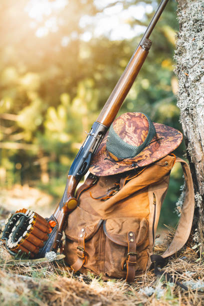 istock bushcraft hunter bag and rifle 1175558717