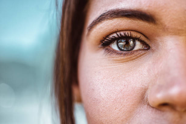 istock Beautiful woman and her blue eyes, macro shot 1175561490
