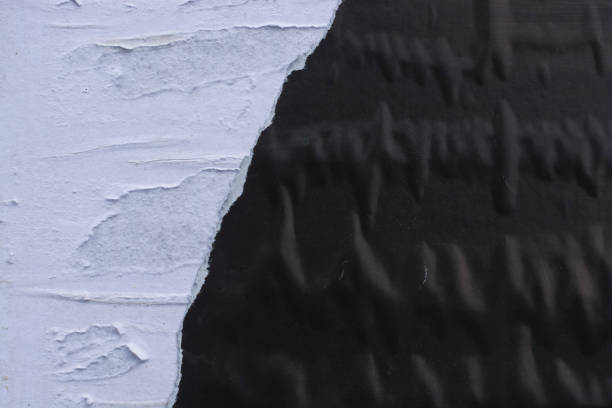 istock Black and white crumpled sheets of paper close-up. 1175563899