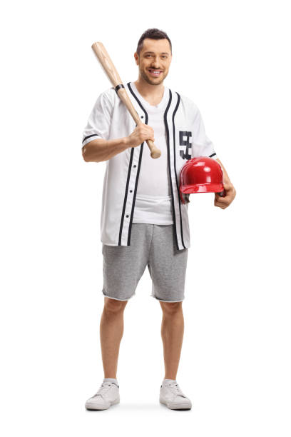 istock Man with a baseball bat and a helmet in his hand 1175568730
