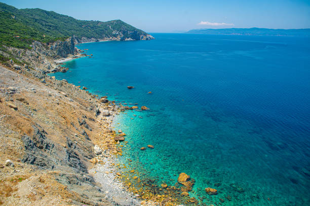 istock Sea and the pebbled beach in Skiathos, Greece 1175571055