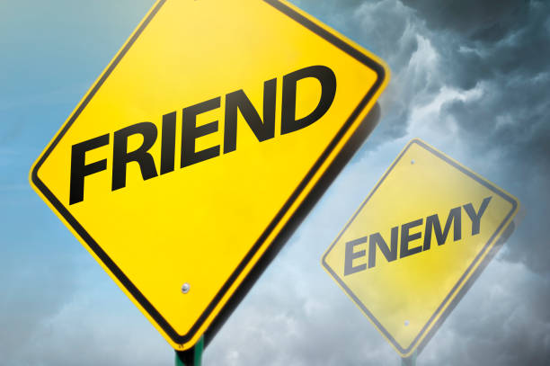 istock FRIEND and ENEMY / Warning sign concept (Click for more) 1175574207