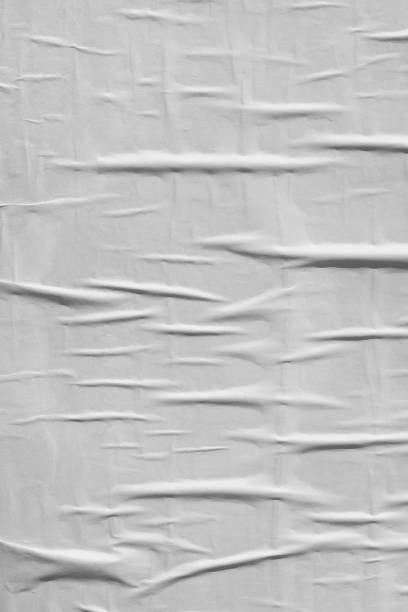 istock Blank white old ripped torn paper crumpled creased posters grunge textures backdrop backgrounds surface placard 1175579042