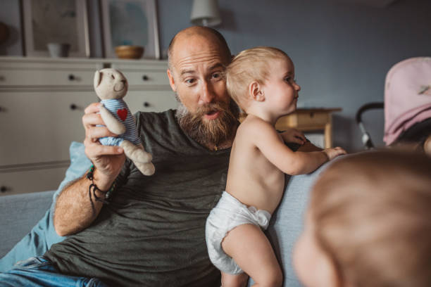 istock Happy family with father 1175579600