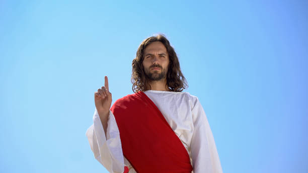istock Strict God pointing finger up, attention to righteous life, avoid temptation sin 1175583682