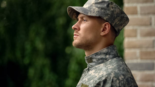 istock Army soldier facing reality of duty, struggling with mental issues, depression 1175585039
