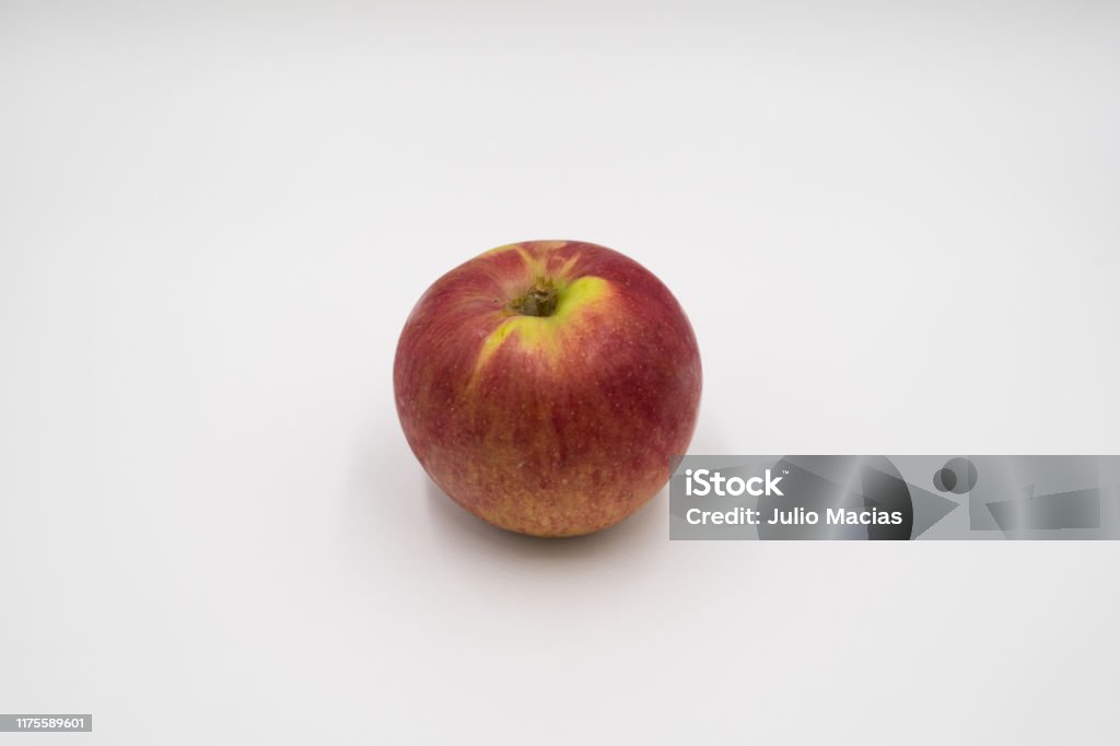 Macintosh Apple on White A macintosh apple isolated on white. Agriculture Stock Photo