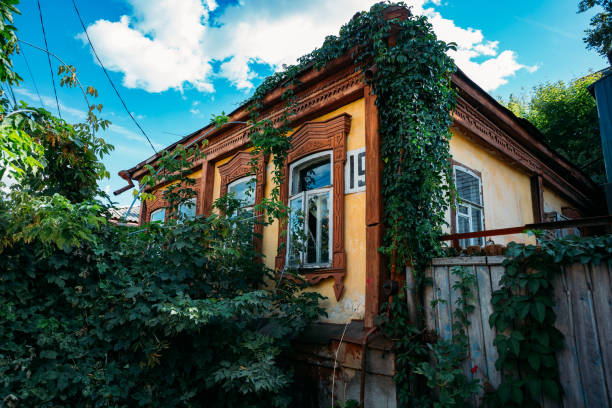 istock Old Russian house with wooden carved window frames 1175590833