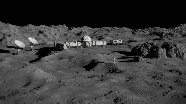 istock astronaut on Moon surface, lunar landscape with permanent base 1175590990