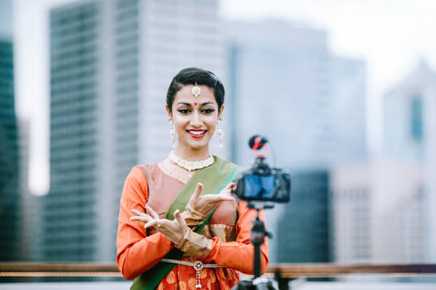istock Indian Woman Vlogging Traditional Dance Routine and Clothing 1175595627