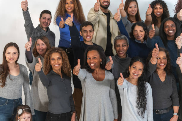 istock Multi-ethnic group of people doing thumbs-up symbol 1175600641