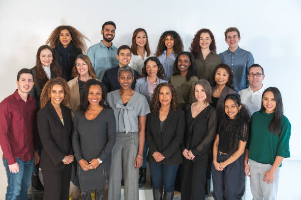 istock Multi-ethnic group of adults posing in studio 1175600646