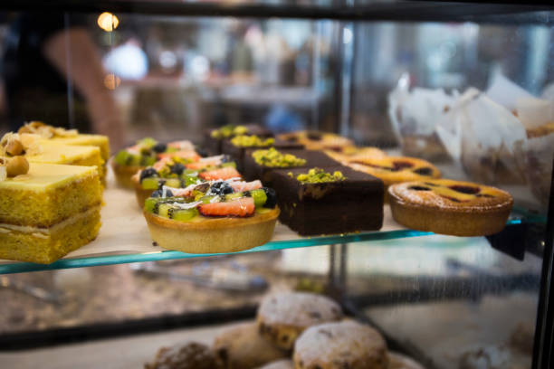 istock Various type of cakes in shop window 1175604989