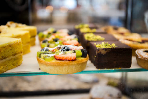 istock Various type of cakes in shop window 1175605024