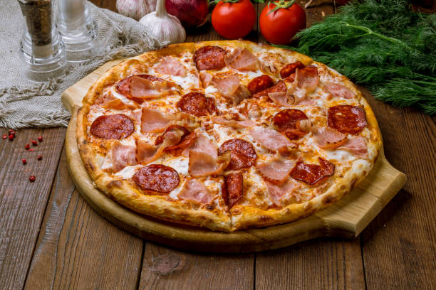 Italian meat pizza stock photo