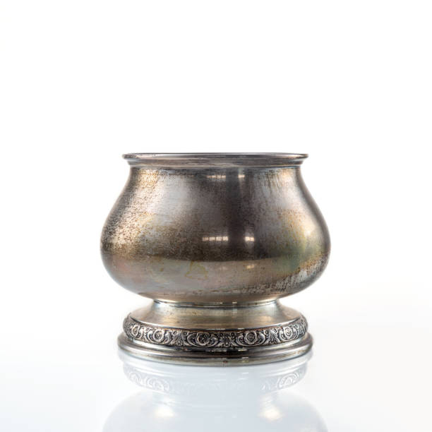 istock Tarnished stering silver sugar bowl for tea set on white background with reflection. copy space 1175607054