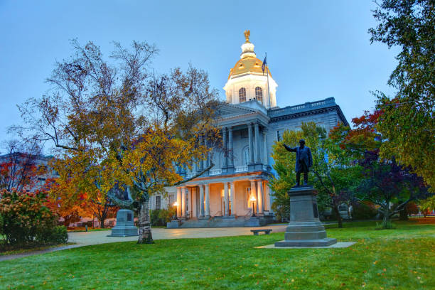 New Hampshire State House in Autumn The New Hampshire State House, located in Concord at 107 North Main Street, is the state capitol building of New Hampshire. concord new hampshire stock pictures, royalty-free photos & images