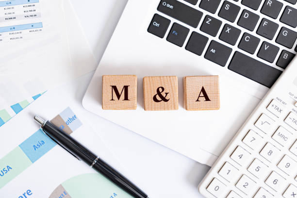 M&A word made with building blocks stock photo